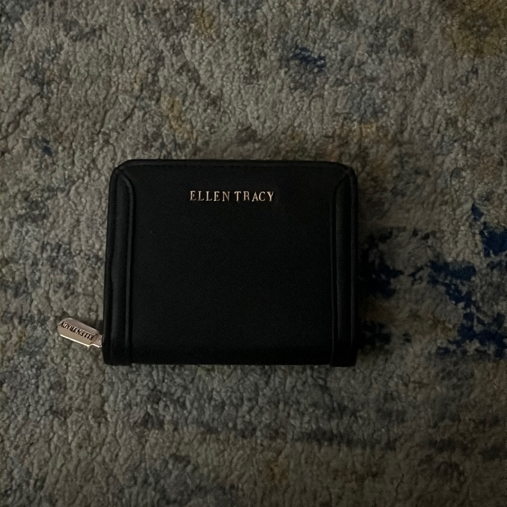Ellen Tracy wallet. Black. Burgundy insole.